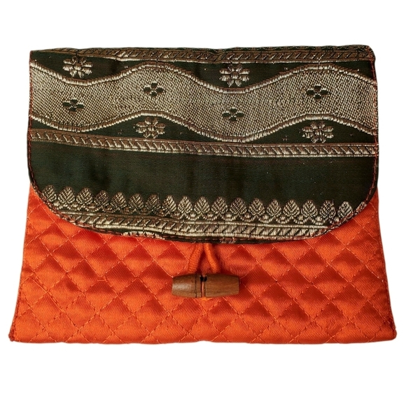 Julie Collection Handbags - Chic Orange, Black, And Silver Quilted Clutch.